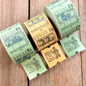 Three rolls of green & yellow vintage British bus tickets