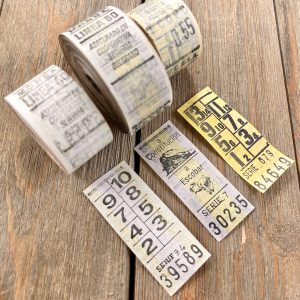 Three rolls of yellow vintage Argentina bus tickets