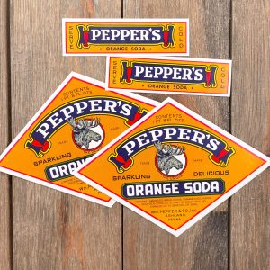 Four assorted vintage Pepper’s Orange Soda Labels from the 1930-40s