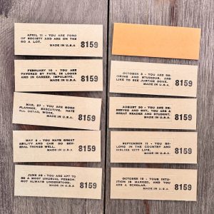 Ten vintage light orange Lucky Horoscope fortune cards