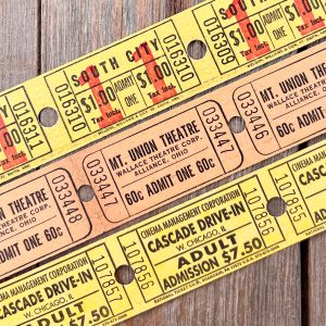 3 Rows of vintage movie theatre tickets in shades of yellow and beige