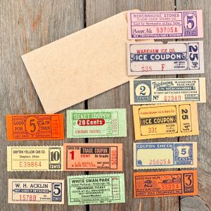 12 Different vintage and antique coupon book tickets with a kraft coin envelope