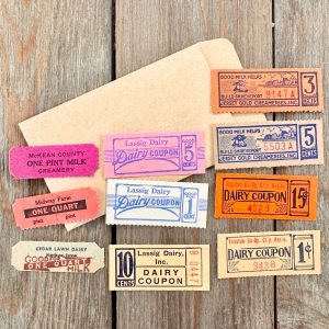 10 Vintage Dairy coupon book tickets with a kraft coin envelope
