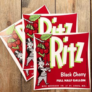 3 Vintage Ritz Black Cherry soda labels featuring illustrations of a cartoon man in a tux and a bunch of cherries