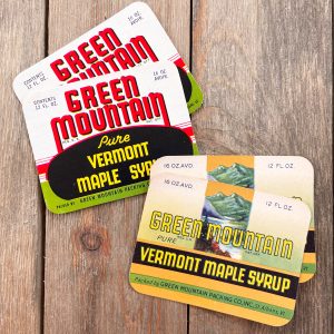 4 Assorted vintage Vermont Maple Syrup labels - one design features a mountain illustration