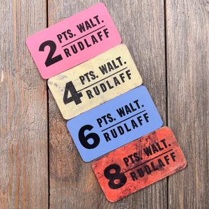 4 Different colorful vintage berry-picking chipboard tickets featuring bold numbers and text