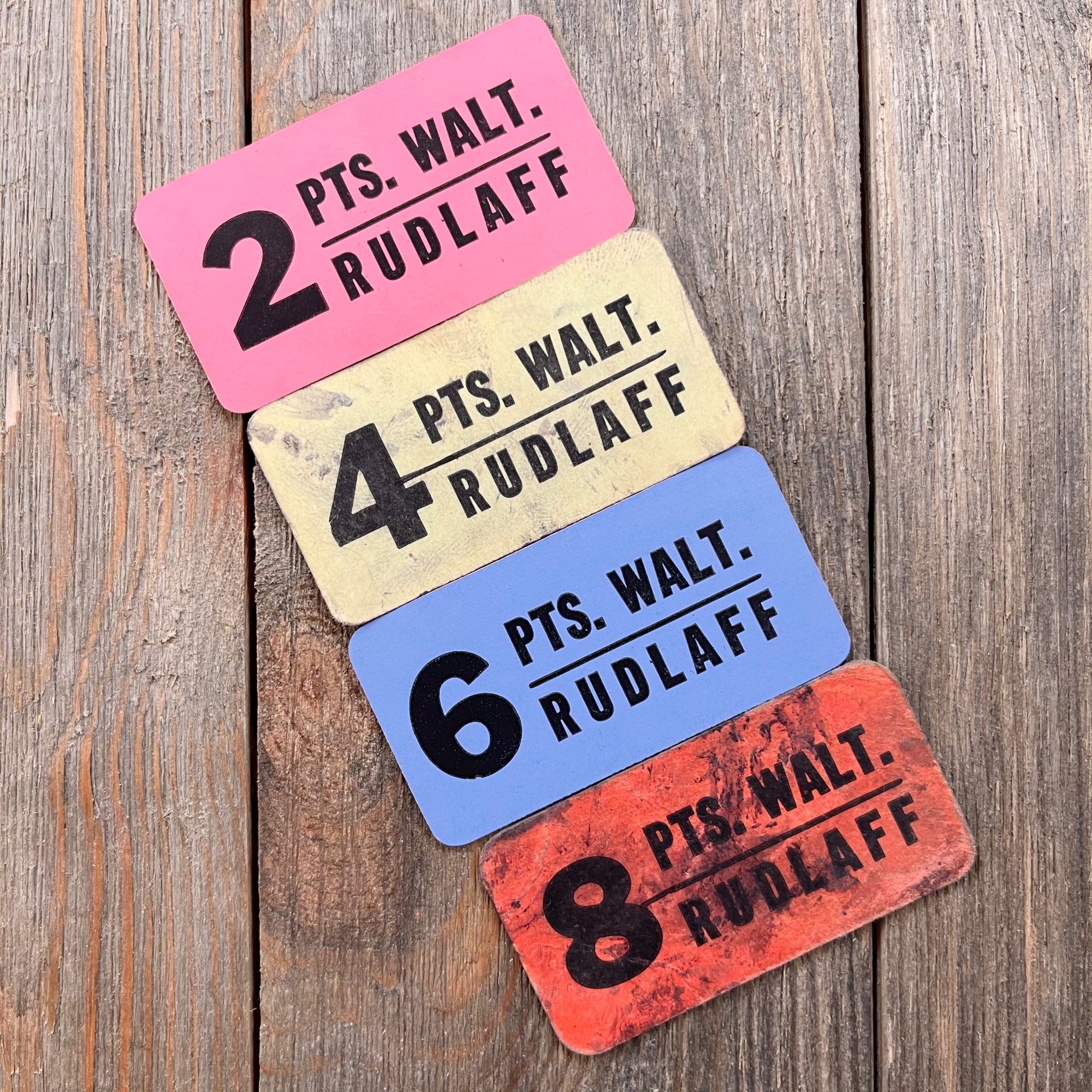 4 Different colorful vintage berry-picking chipboard tickets featuring bold numbers and text