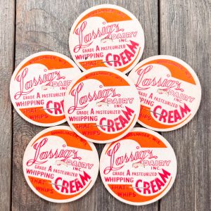 6 vintage red, orange and white whipping cream caps with a flourish style