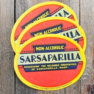 3 Vintage Non-Alcoholic Sarsaparilla soda labels in red, yellow and blue with bold text