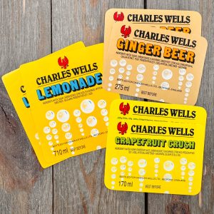 6 Assorted vintage Charles Wells brand soda labels - Lemonade, Ginger Beer, and Grapefruit Crush