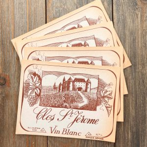 4 Vintage aged wine labels in French, featuring an illustration of a French castle