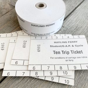 A roll of British white Hayling Ferry tickets on top of 6 larger white Hayling Ferry tickets