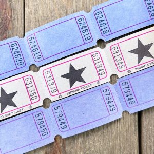 Three rows of vintage blank blue and white carnival tickets