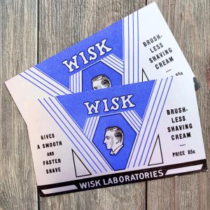 Two vintage blue and silver Wisk Shaving Cream labels